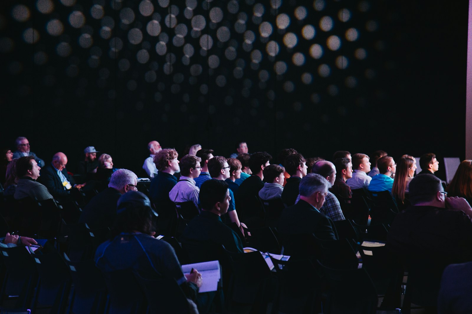 Audience seated at a press event