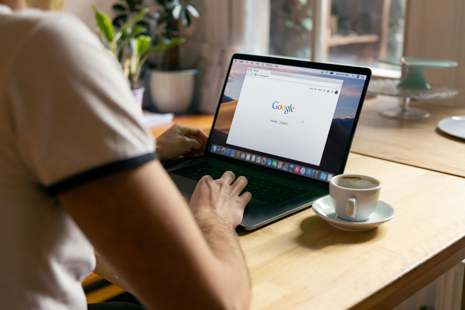 Person reviewing search results on a laptop